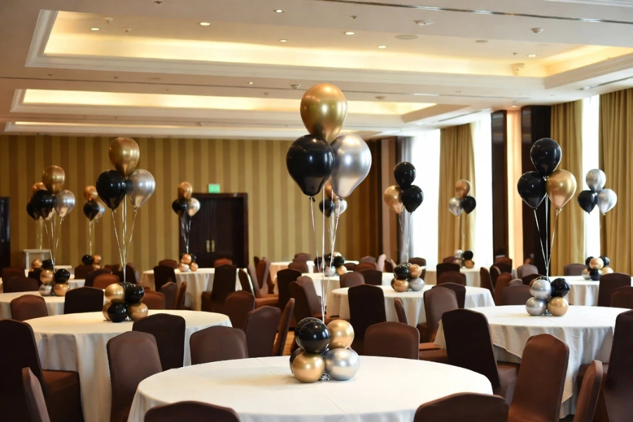 corporate banquet balloon centerpieces in large event hall