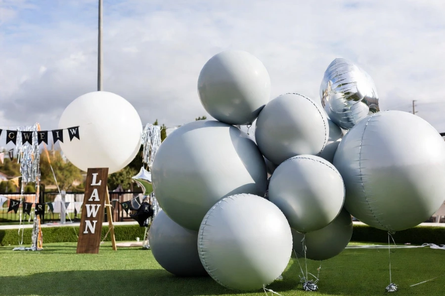 outdoor 50s themed party decoration with reinforced balloons