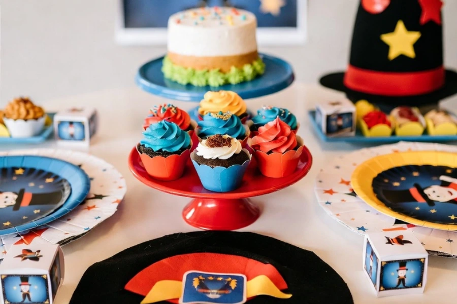 magic themed birthday party dessert table with themed plates cups and decorations